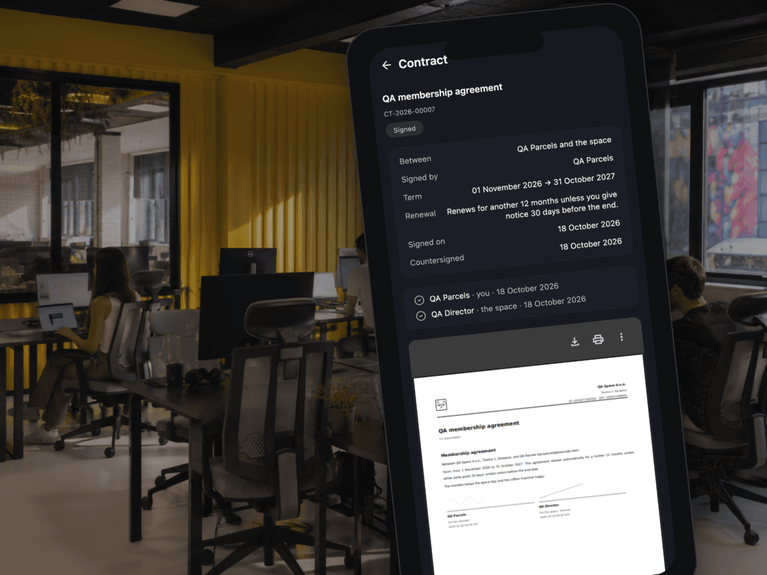 A phone at the desks showing a signed contract in the member app